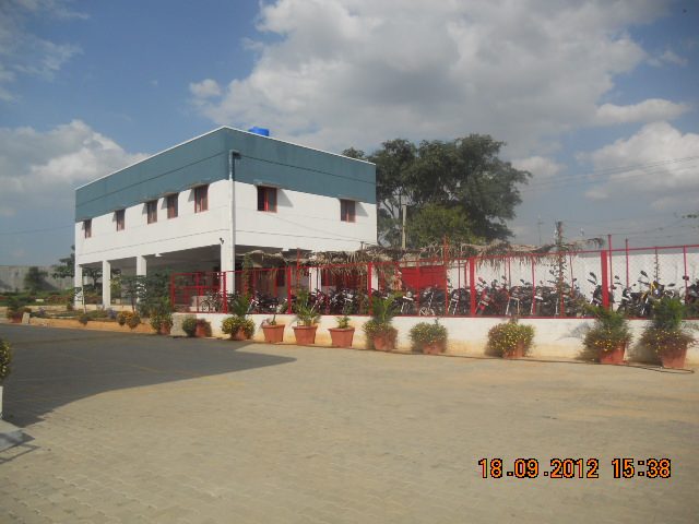 Office block and two-wheeler parking at Indian Design Exports Pvt Ltd, Bangarpet
